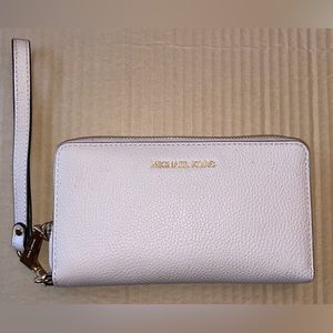 Pale Pink Michael Kors Wristlet with Gold Hardware. Brand new, never used.